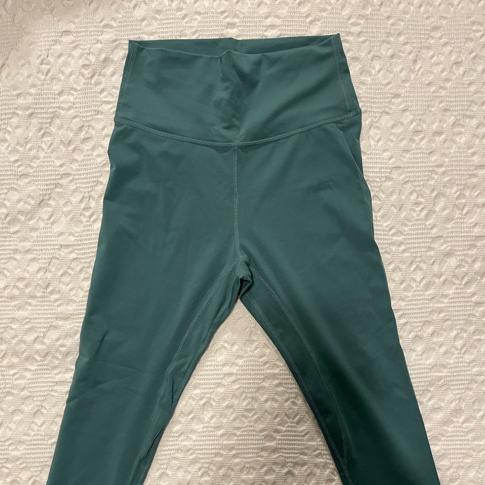 Green leggings